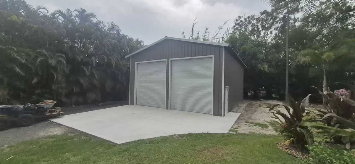 Pole barn with both roll-up doors closed