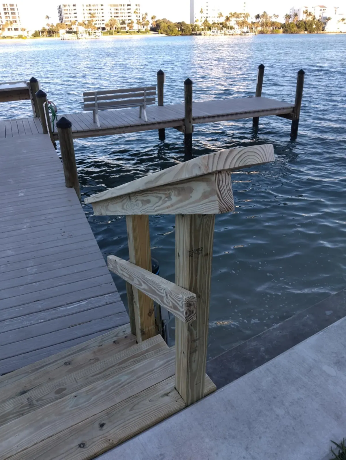 Dock with new stairs and handrails down from the seawall