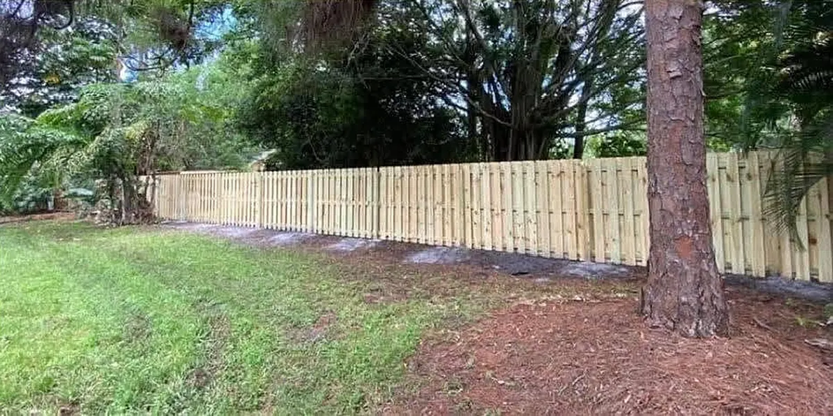 Shadowbox fence along a wooded lot