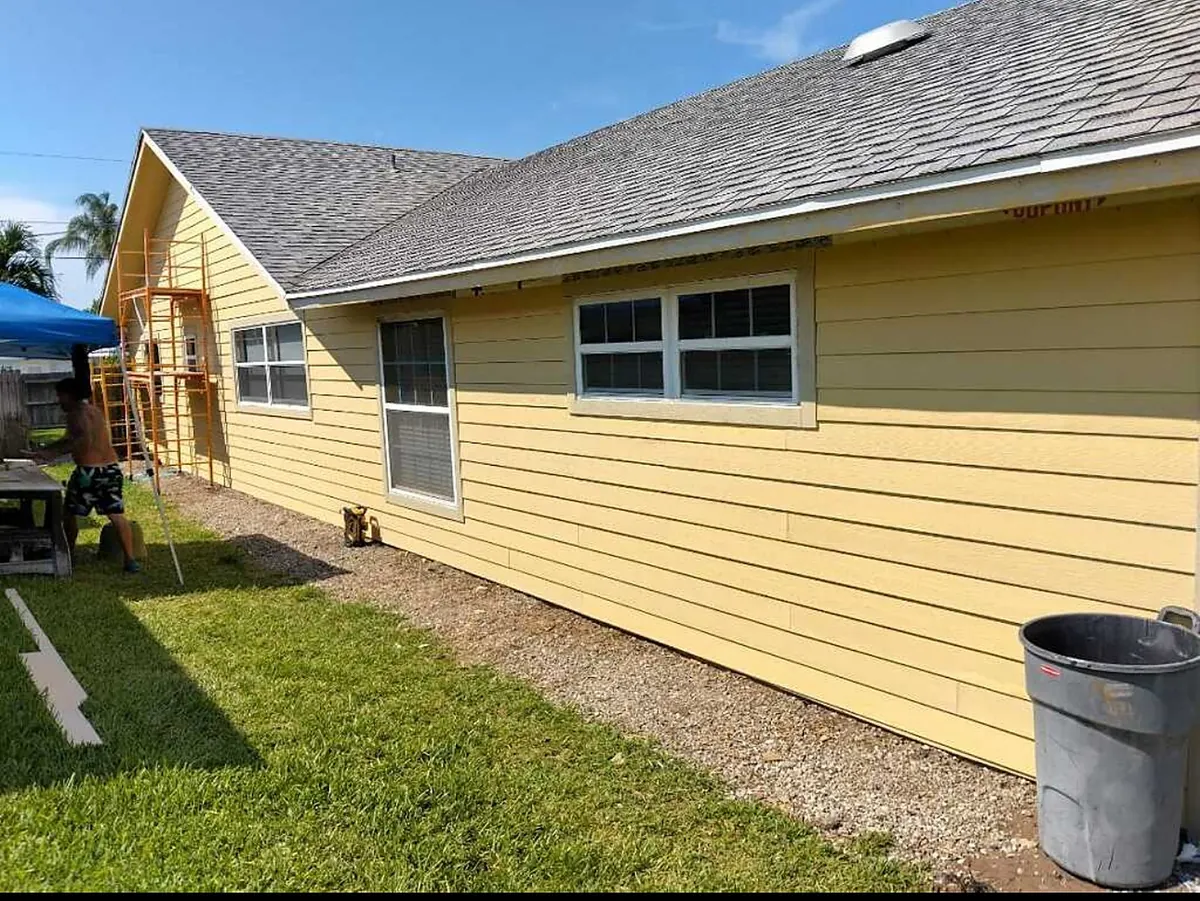 House finished in new lap siding by Coastline Innovations